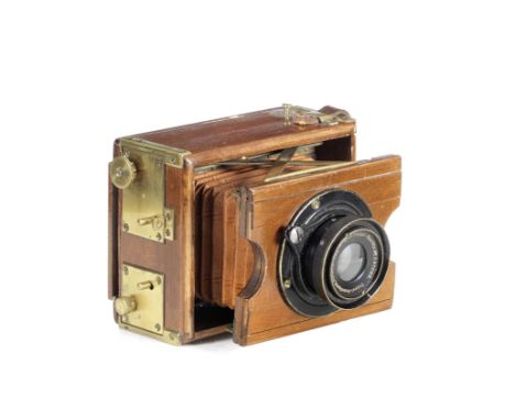 A Graefe &amp; Bardorf Tropical Clarissa Camera,4.5cm x 6cm with Helioplan 75mm f/4.5 lens no. 247095, brown leather bellow a