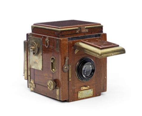 A Salex Quarter-Plate Tropical reflex Camera,with Ross Xpres 6in f/4.5 lens no.99373, tan leather bellow and holding hood and