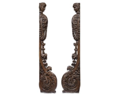 A pair of large 17th century and later carved oak architectural elementsFormed as scrolling acanthus leaves surmounted by pro