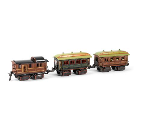 MÄRKLIN 0 gauge three bogie coaches, 1904-1909Cat. ref 1846/0 Luggage van painted in brown livery with yellow lining, double 