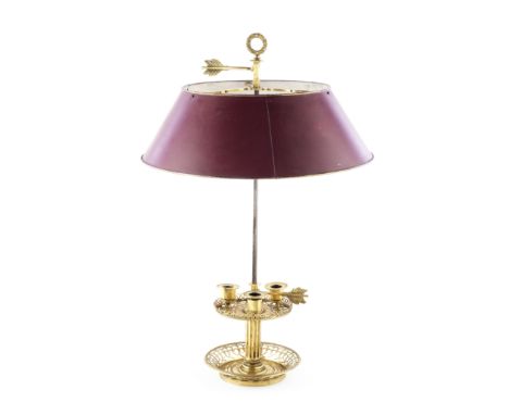 A Directoire Gilt-brass Bouillotte LampWith an adjustable red painted tole shade above three candle sconces on a fluted colum
