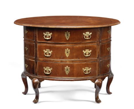 An unusual mid-18th century and later Mahogany Oval Bureau CommodePossibly Berlin or HamburgThe oval top above three drawers 