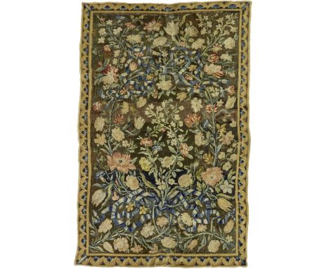 A Louis XIV Savonnerie FragmentWoven with floral garlands tied with blue ribbons, 203cm x 134cm Footnotes:Provenance: Christi