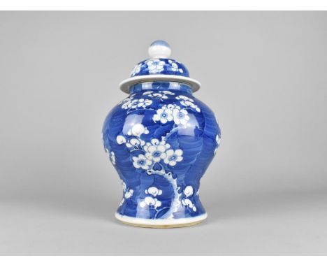 A Chinese Late Qing Dynasty Porcelain Blue and White Prunus Pattern Jar and Cover, Four Character Mark for Kangxi to Base, 27