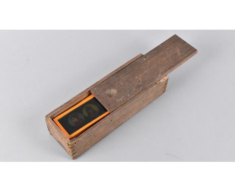 A Vintage Wooden box Containing Seventeen Children's Coloured Magic Lantern Slides 