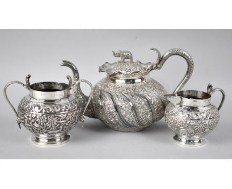 An Indian Low Grade Silver Three Piece Tea Service with Cobra Handle and Elephant Finial to Teapot Lid, Total Weight 927gms 