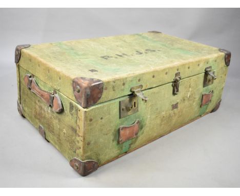 A Vintage Canvas Covered Travelling Trunk with Leather Protectors, 91cms wide 