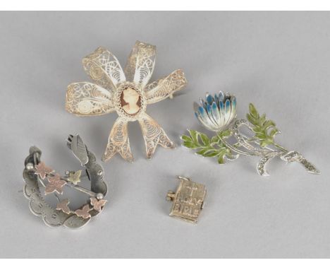 Two Silver Brooches and a Silver Bible Charm Inside Written Lords Prayer and the Ten Comandments, together with a Metal Ename