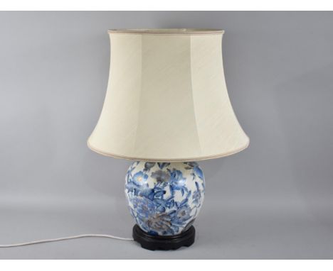 An Oriental Table Lamp and Shade in the Form of a Lidded Ginger Jar, 55cms High Overall 