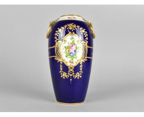 A Mintons Vase Decorated with Hand Painted Floral Cartouches on Blue Ground with Gilt Detailing, the Vase Having Stylised Rin