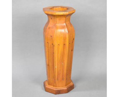 A Modern Wooden Stick Stand in the Form of an Octagonal Vase, 60cms High 