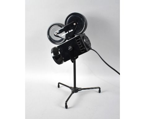 A Modern Novelty Table Lamp inthe Form of a Hollywood Film Camera, 35cms High 