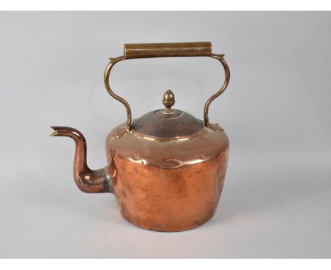 A Large Copper Kettle with Acorn Finial, 32cms High 