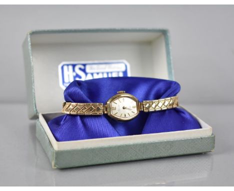 A 9ct Gold Cased Ladies Everite Vintage Wristwatch, on unrelated Expanding Non-Gold Strap. Working Order, Complete with Vinta