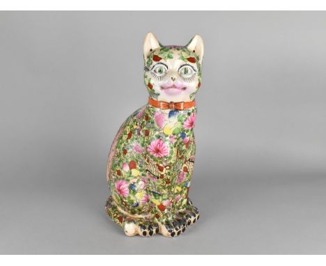 A Large Chinese Porcelain Study of a Seated Cat Decorated in the Famille Rose Palette, 36cm high 