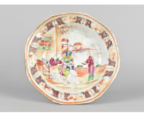 A Chinese Qing Dynasty Porcelain Dish Decorated in the Mandarin Palette Depicting Figures in Exterior Garden Setting, 18th Ce