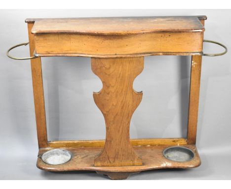 A Late 19th/Early 20th Century Oak Hall Stick Stand with Serpentine Front and Brass Hoops Either Side with Metal Trays, 110cm