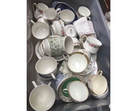 A box of saucers, cups, etc to include Wedgwood, Worcester, etc 