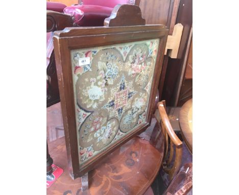 A needlework fire screen, height 67cm. 