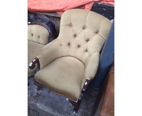 A button back armchair 