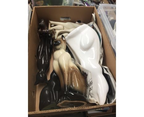A box of ceramic cats ornaments 
