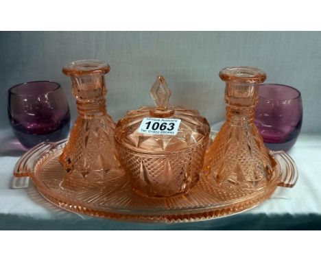A pink glass Art deco dining table trinket set etc.