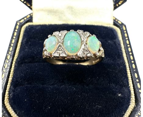 9ct gold white opal three stone ring with diamond highlights (4.1g) 