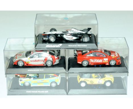 Scalextric a boxed Slot Car group to include Ford Focus Police Car, McLaren Mercedes Formula 1 Racing Car, Mercedes CLK Racin