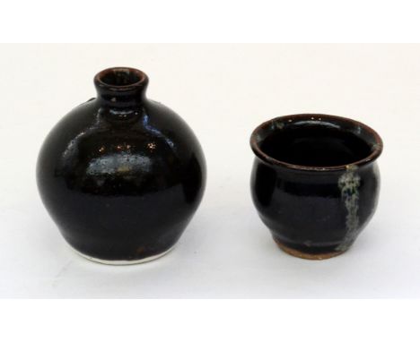 A small tenmoku glazed Leach Pottery bottle vase Leach Pottery impressed marksHeight of vase 7.5 cmTogether with a similar eg