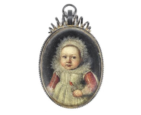Flemish School, 17th CenturyPortrait of a child, half-length, holding a rattle indistinctly inscribed (on the reverse)oil on 