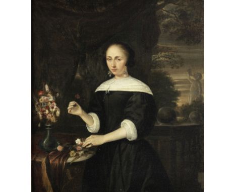 Circle of Nicolaes Maes (Dordrecht 1634-1693 Amsterdam)Portrait of a lady, three-quarter-length, in a black dress with white 