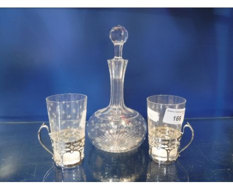 A PAIR OF CUT-GLASS CUPS with silver holders and a similar decanter (3)