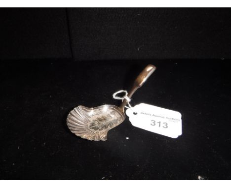 A VICTORIAN SILVER CADDY SPOON with bright-cut decoration