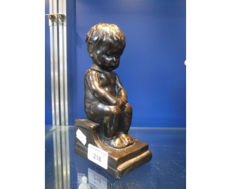 A BRONZED SCULPTURE OF A BOY SEATED ON A STEP inscribed on verso ''The Philosopher'', S R Pearson, 1916', 7.5" high 