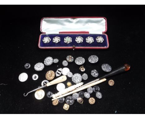 A SET OF SIX 19TH CENTURY CASED BUTTONS and a collection of other similar buttons and button hooks