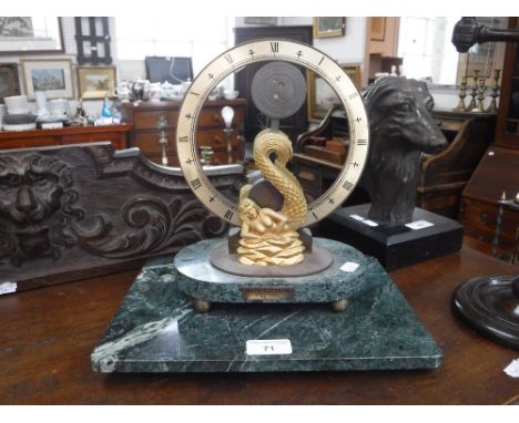 DEVON CLOCKS LTD: A LIMITED EDITION MANTEL CLOCK with a gilt metal 'Mermaid' support on a green marble base, 12" high