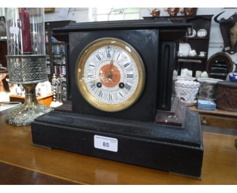 A 19TH CENTURY SLATE-CASED MANTEL CLOCK, 8.5" high