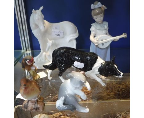 A NAO FIGURE OF A GIRL PLAYING A MANDOLIN, a Beswick Robin and Goldfinch figure, a Lladro porcelain cat, a Royal Doulton Shee