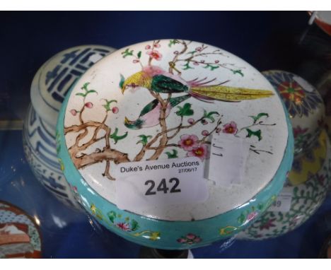 A CHINESE CANTON ENAMEL CIRCULAR BOX AND COVER, painted with a pair of pheasants perched in plume blossom, 20th century, 12.3
