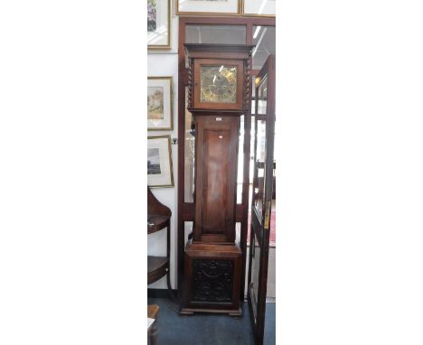 A 20TH CENTURY WALNUT LONGCASE CLOCK incorporating an old eight day movement and carved panel to the base, 85" high 