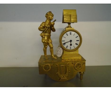 A 19th century French ormolu figural mantle clock with Bentley and Beck London movement, 5.5cm dial with Roman numerals, 23cm