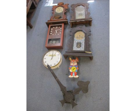 Four 20th century wall clocks A/F to include a retro battery-operated Rhythm wall clock, together with a Metamec date clock, 