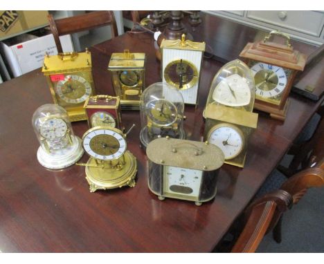 A selection of mantle and anniversary clocks to include those by the London Clock Co, Rhythm, Kundo, Acctim, Kundo electronic