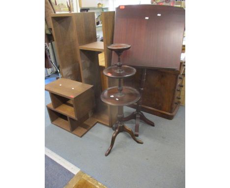 A modern oak effect multi sectional shelf unit in two pieces together with a modern mahogany effect lectern/book holder and a