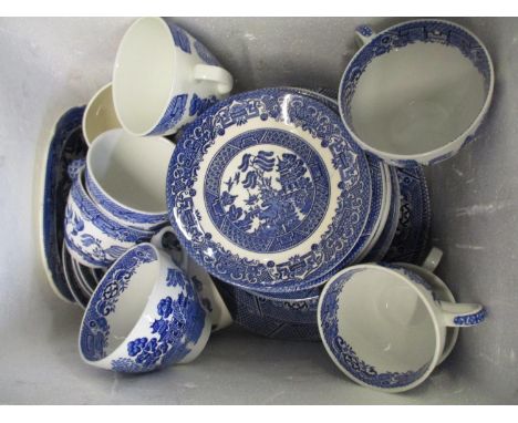 A ceramic part tea and dinner service with blue and white Willow pattern Location: RA 