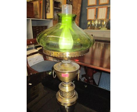 A vintage brass lamp in the form of an oil lamp with green glass shade 57cm h Location: RA 