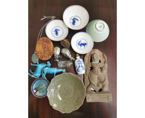 A collection of miscellaneous Asian works of art, to include two Chinese snuff bottles, one blue and white, the other reverse