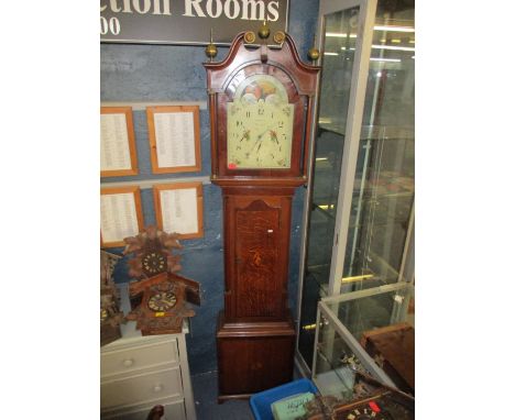 A late 18th/early 19th century mahogany and oak long case clock marquetry inlaid, by Pearson of Halifax, with swan neck pedim