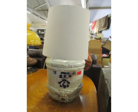 A Japanese Sake barrel after Meiji period, converted into a table lamp 28cm h without shade, 53cm h with shade (Condition: No