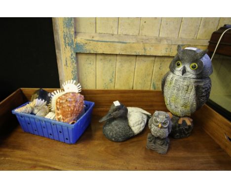 Three bird garden ornaments, shells, etc.